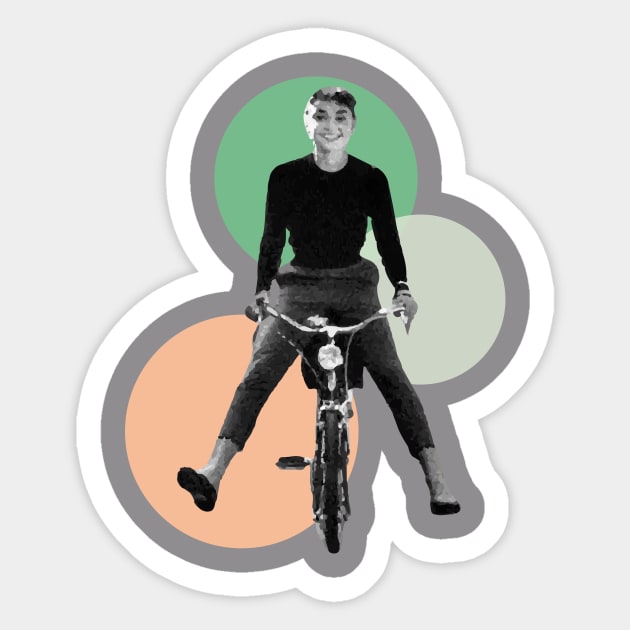 Audrey Hepburn on a bicycle Sticker by NickiPostsStuff